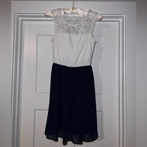 White and navy Semi Casual above the knee dress. Size XS